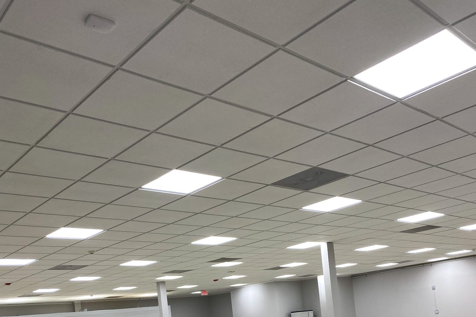 Completed LED lighting installation in an open commercial space.